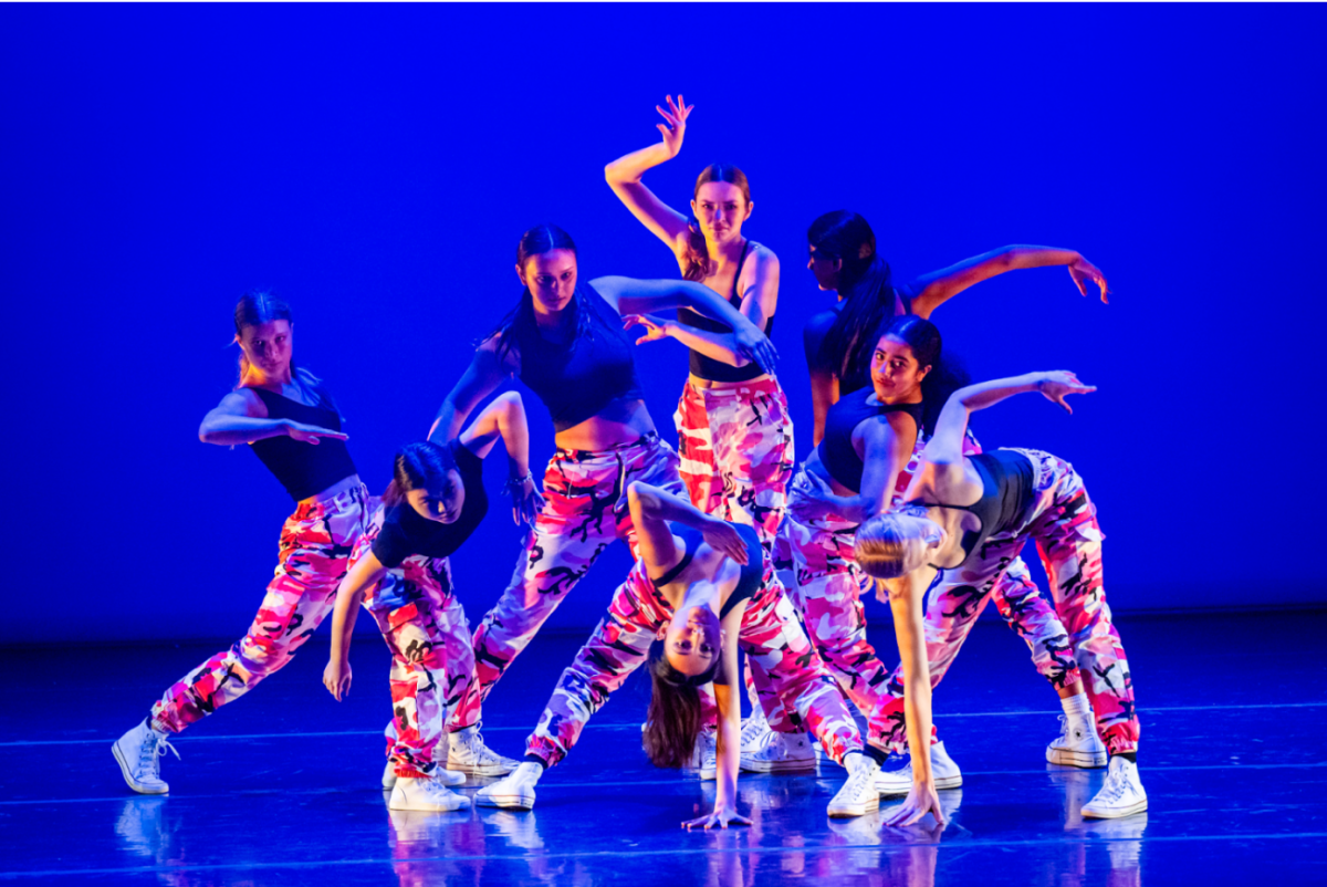 Chrysalis dancers striking a fierce pose in their 